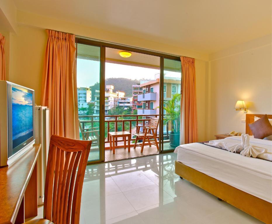 Orchid Garden Hotel Patong Quarto foto